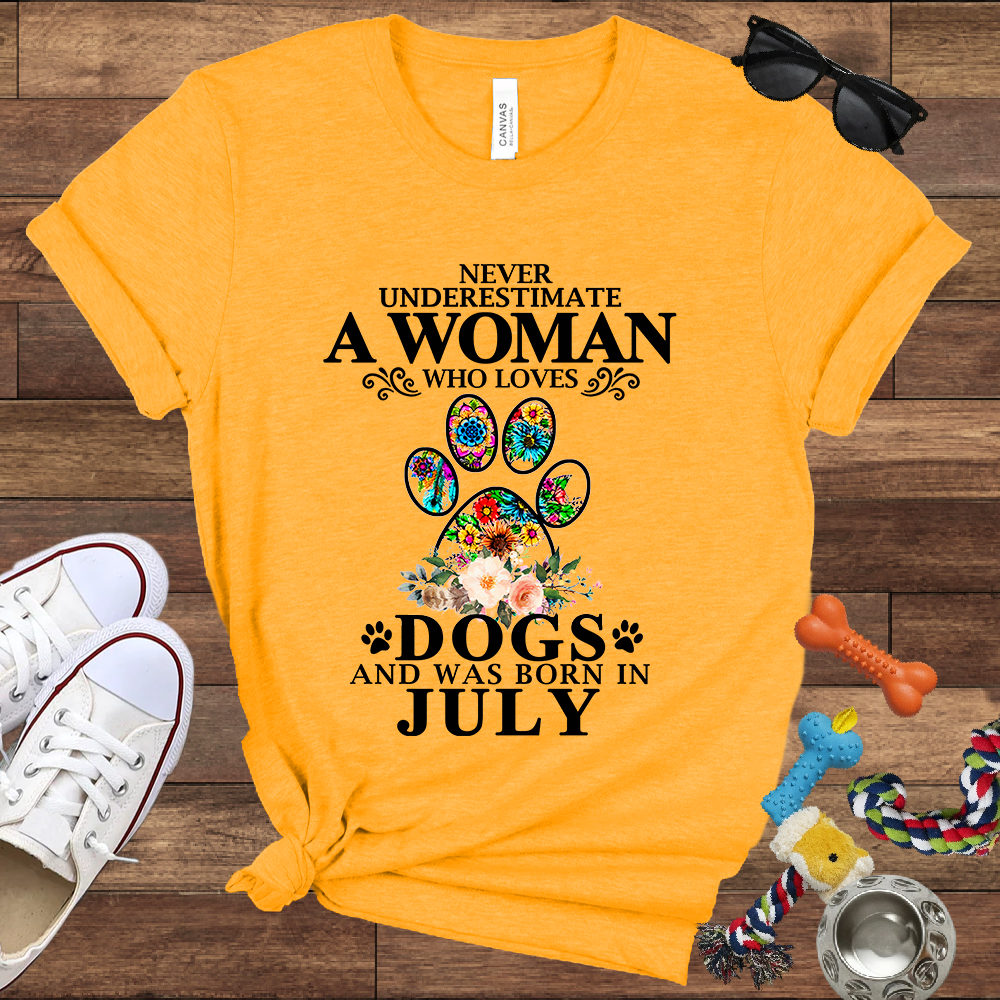 Never Underestimate A Woman Who Loves Dogs And Was Born In July - Bella Canvas T-shirt: Great Gifts for Dog Owners