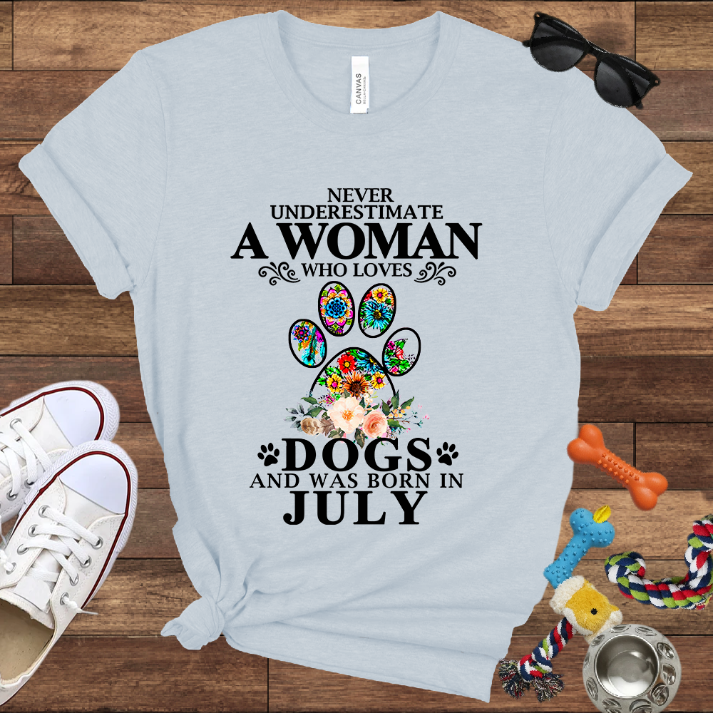 Never Underestimate A Woman Who Loves Dogs And Was Born In July - Bella Canvas T-shirt: Great Gifts for Dog Owners