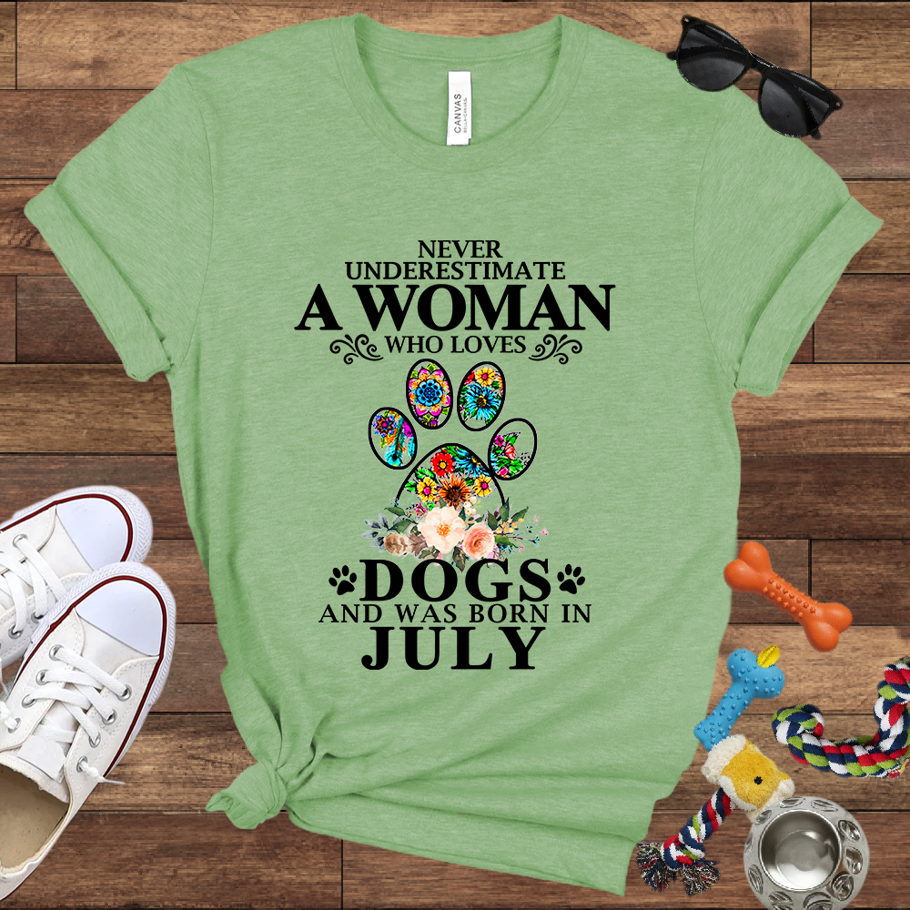 Never Underestimate A Woman Who Loves Dogs And Was Born In July - Bella Canvas T-shirt: Great Gifts for Dog Owners