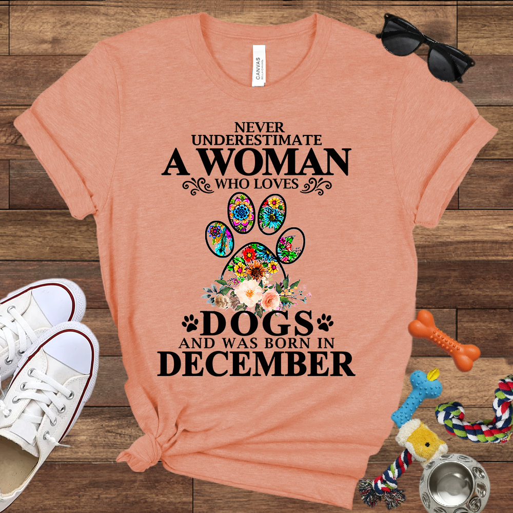 Never Underestimate A Woman Who Loves Dogs And Was Born In December - Bella Canvas T-shirt: Great Gifts for Dog Owners