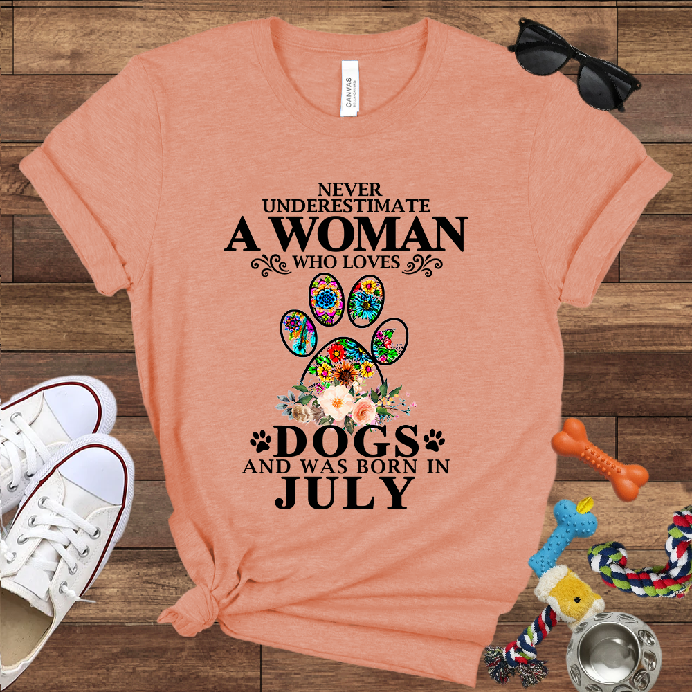 Never Underestimate A Woman Who Loves Dogs And Was Born In July - Bella Canvas T-shirt: Great Gifts for Dog Owners