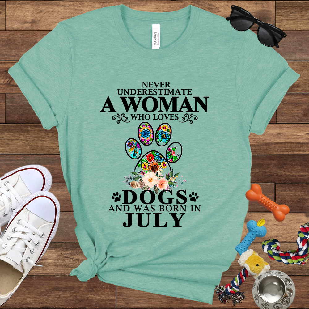 Never Underestimate A Woman Who Loves Dogs And Was Born In July - Bella Canvas T-shirt: Great Gifts for Dog Owners