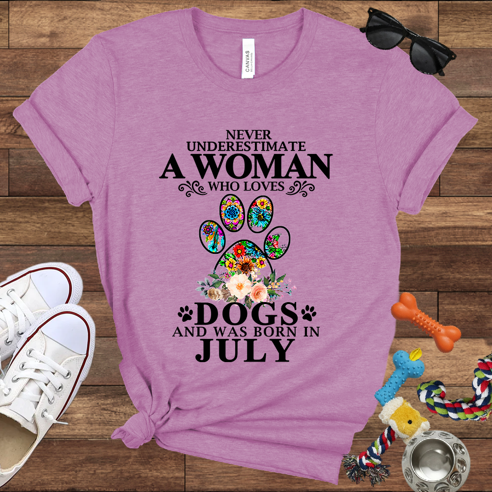 Never Underestimate A Woman Who Loves Dogs And Was Born In July - Bella Canvas T-shirt: Great Gifts for Dog Owners