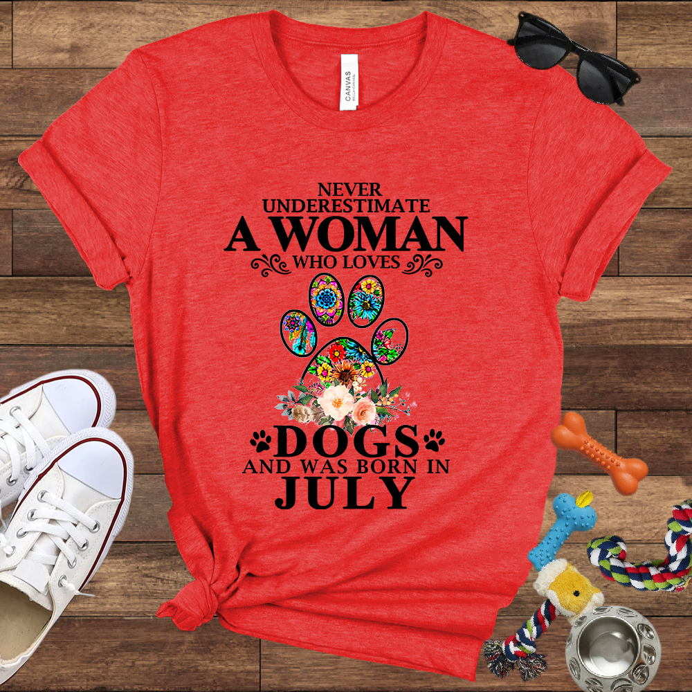 Never Underestimate A Woman Who Loves Dogs And Was Born In July - Bella Canvas T-shirt: Great Gifts for Dog Owners