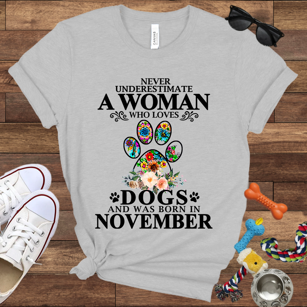 Never Underestimate A Woman Who Loves Dogs And Was Born In November - Bella Canvas T-shirt: Great Gifts for Dog Owners