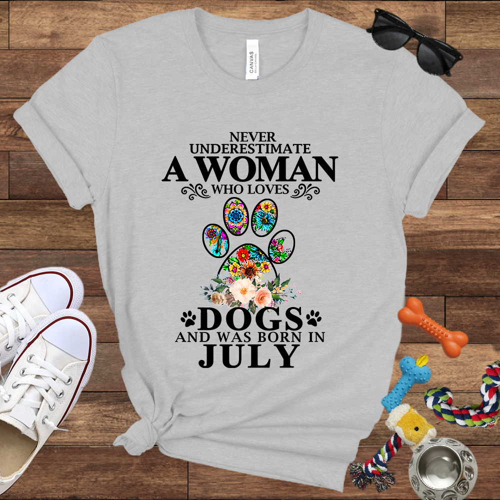 Never Underestimate A Woman Who Loves Dogs And Was Born In July - Bella Canvas T-shirt: Great Gifts for Dog Owners