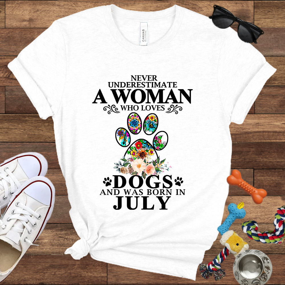 Never Underestimate A Woman Who Loves Dogs And Was Born In July - Bella Canvas T-shirt: Great Gifts for Dog Owners