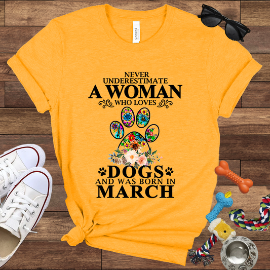 Never Underestimate A Woman Who Loves Dogs And Was Born In March - Bella Canvas T-shirt: Great Gifts for Dog Owners