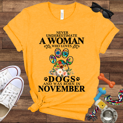 Never Underestimate A Woman Who Loves Dogs And Was Born In November - Bella Canvas T-shirt: Great Gifts for Dog Owners