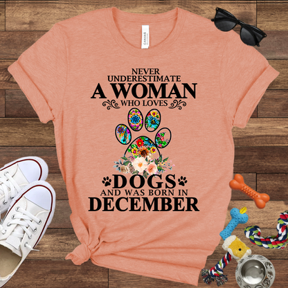 Never Underestimate A Woman Who Loves Dogs And Was Born In December - Bella Canvas T-shirt: Great Gifts for Dog Owners