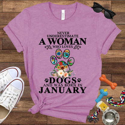 Never Underestimate A Woman Who Loves Dogs And Was Born In January - Bella Canvas T-shirt: Great Gifts for Dog Owners