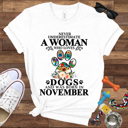 Never Underestimate A Woman Who Loves Dogs And Was Born In November - Bella Canvas T-shirt: Great Gifts for Dog Owners